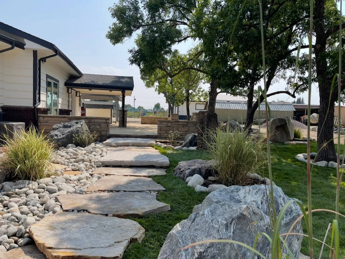 Boulder & stepper front yard