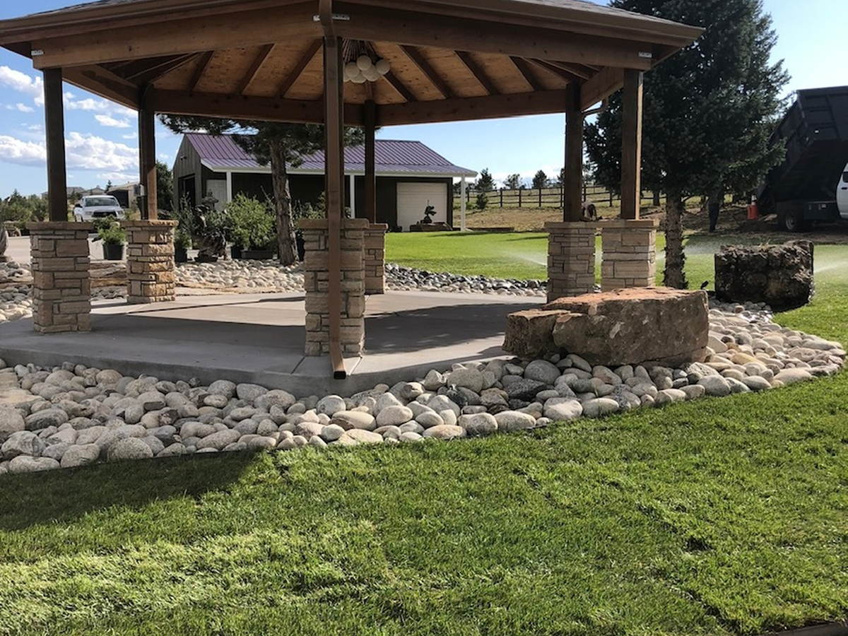 Shade structure — Pergola set on a stone pad