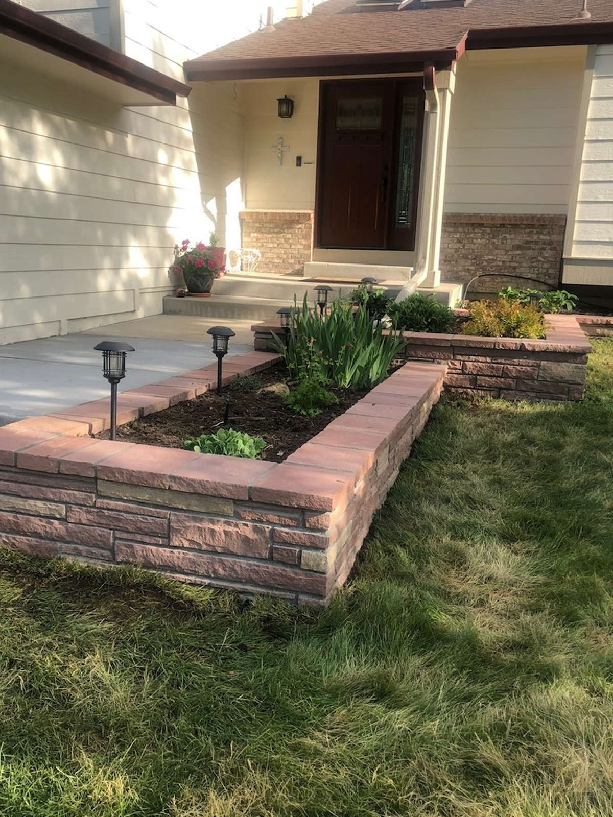 Block planter wall — Raised entry planter with path lighting
