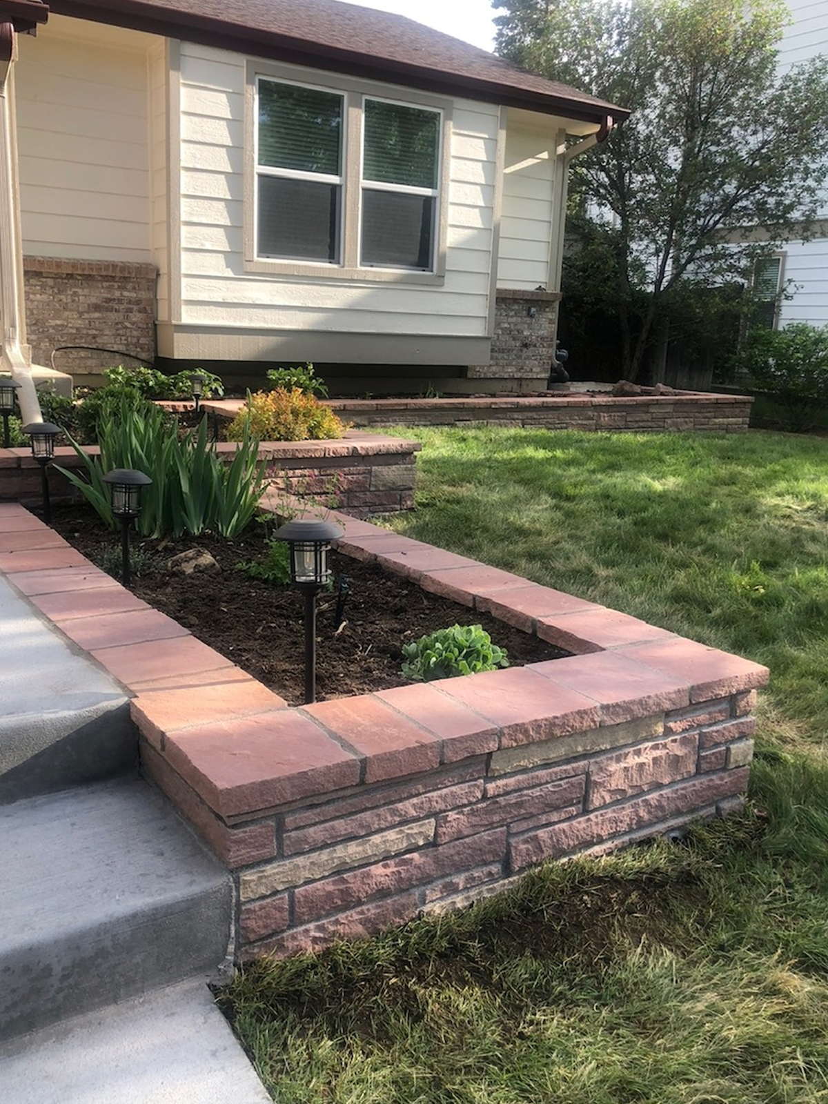 Planter and steps — Raised bed tied into the front steps