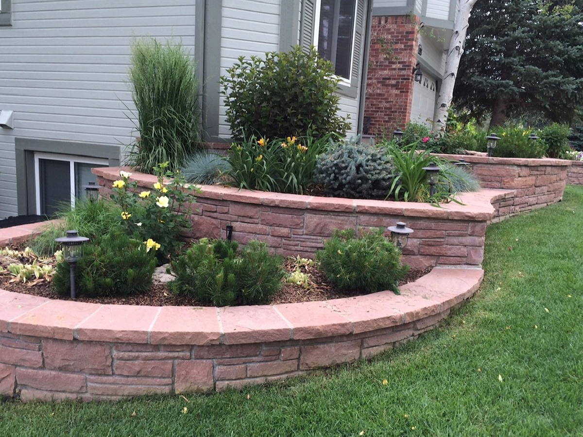 Curved planter wall — Block wall shaped to the driveway line